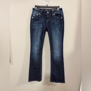Women’s Miss Me Mid Rise Dark Blue Bootcut Jeans. Angel Wings pockets. Size 26